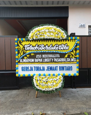 Papan Bunga Duka di Pandowoharjo